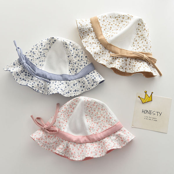 Lillemotiivide ja paelaga võrkkangast lastemüts