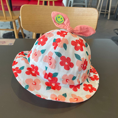 Värviline lillemotiividega lastemüts