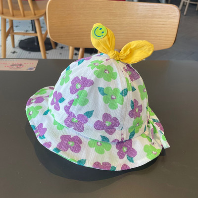 Värviline lillemotiividega lastemüts