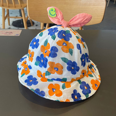 Värviline lillemotiividega lastemüts