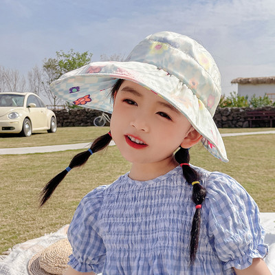 Laia äärega tekstiilist lastemüts