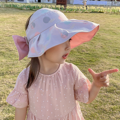 Laia äärega tekstiilist lastemüts