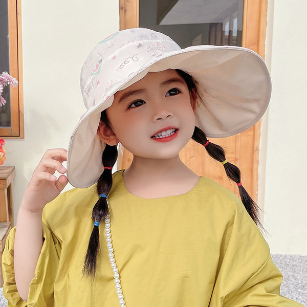 Laia äärega tekstiilist lastemüts