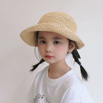 Детска плетена шапка с панделка за момичета