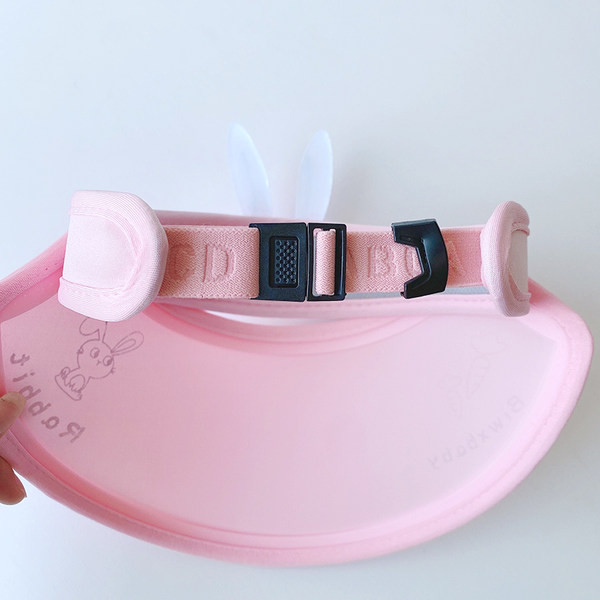 Laste tekstiilist visiir kirja ja 3D elemendiga