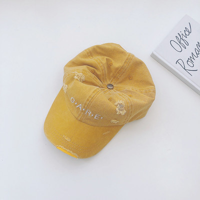 Visiirtikandiga ja rebitud motiividega lastemüts