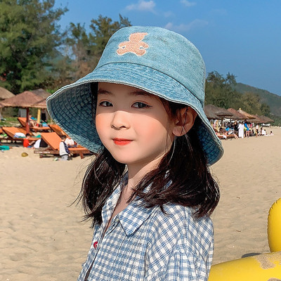 Laste värvilise tikandiga teksamüts