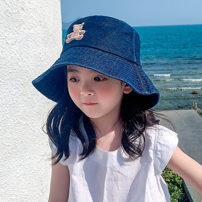 Laste värvilise tikandiga teksamüts