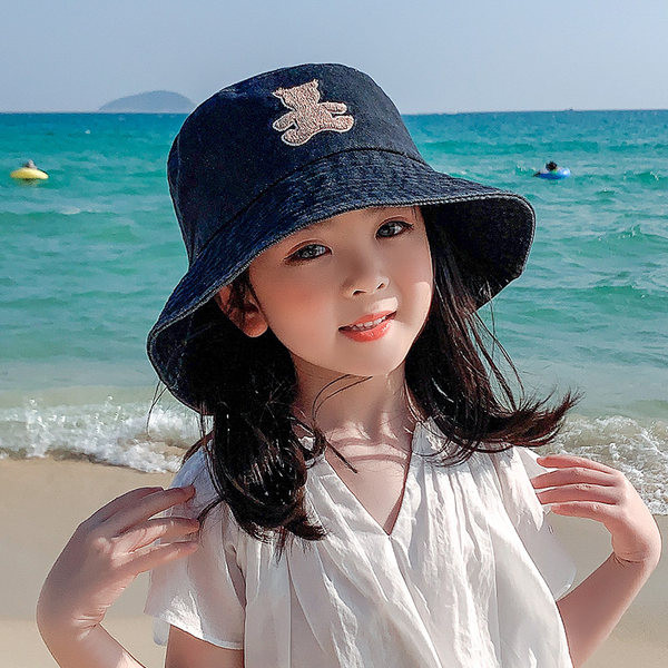 Laste värvilise tikandiga teksamüts