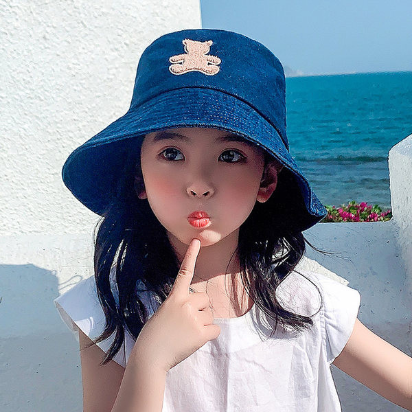 Laste värvilise tikandiga teksamüts