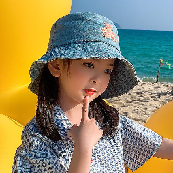 Laste värvilise tikandiga teksamüts