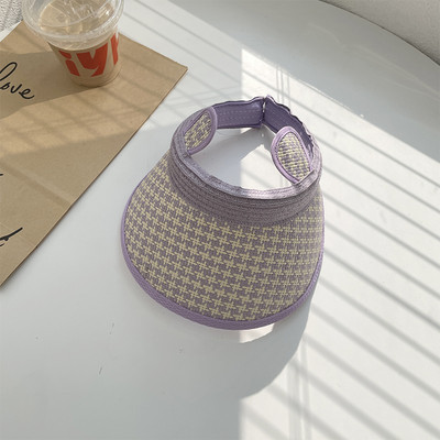 Ruuduline aasadega tekstiilist visiir