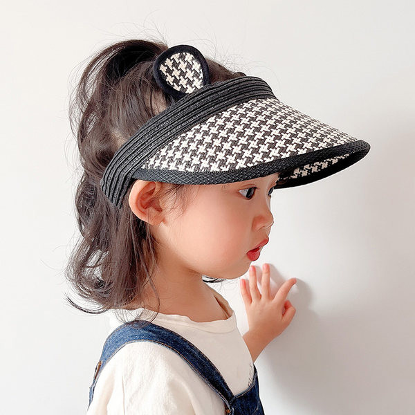 Ruuduline aasadega tekstiilist visiir