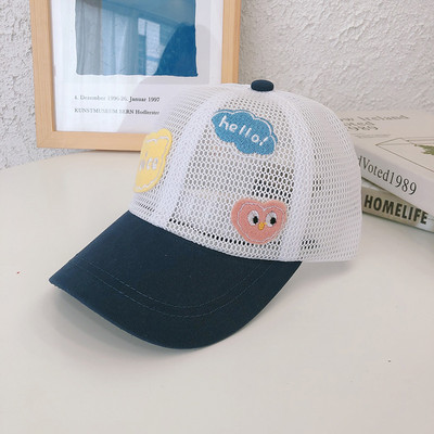 Laste võrkmüts visiiri ja embleemiga