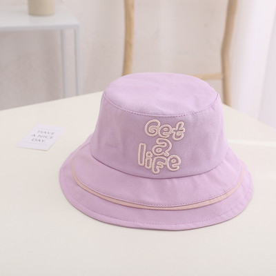 Päikesekaitsega lastemüts tikandiga