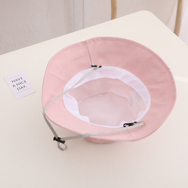 Päikesekaitsega lastemüts tikandiga