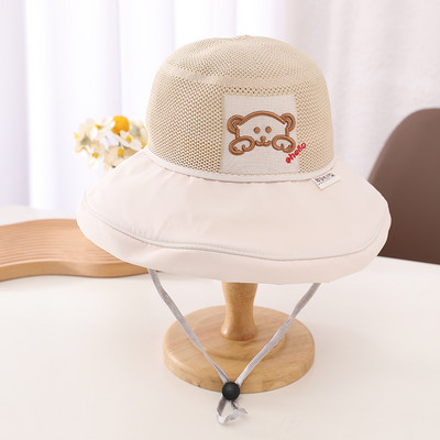 Tekstiilist müts võrgu ja laia äärega