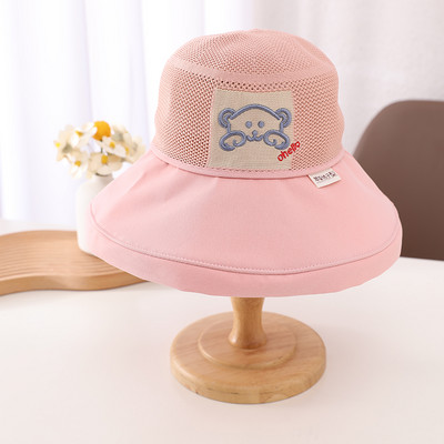 Tekstiilist müts võrgu ja laia äärega