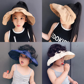 Laia äärega tekstiilist lastevisiir