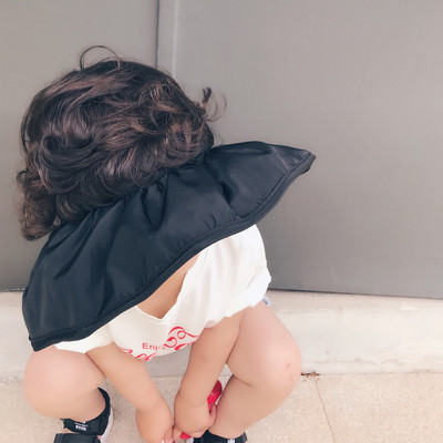 Laia äärega tekstiilist lastevisiir