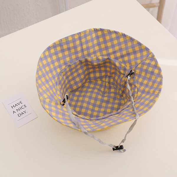 Tekstiilist värvilise tikandiga lastemüts