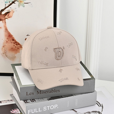 Laste pesapallimüts visiiriga ja tikitud pealdisega