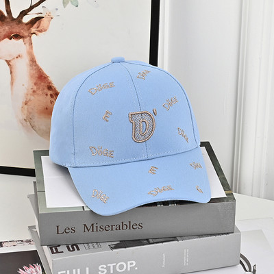 Laste pesapallimüts visiiriga ja tikitud pealdisega