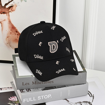 Laste pesapallimüts visiiriga ja tikitud pealdisega