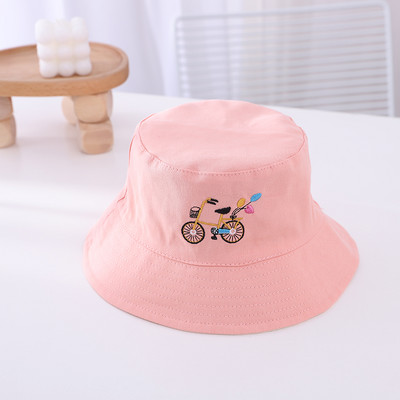 Tikandite ja lipsudega lastemüts