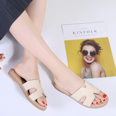 Ženske papuče s ravnim potplatom i remenom od eko kože