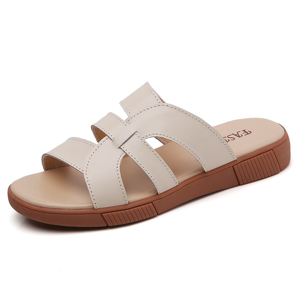 Öko-nahast rihmade ja lameda tallaga naiste sussid