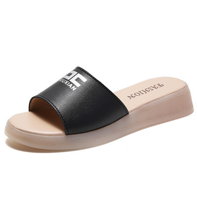 Öko-nahast naiste sussid platvormiga 3 cm ja pealdisega