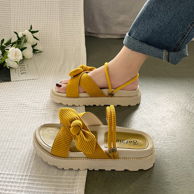 Ženske papuče s tekstilnim naramenicama i trakom