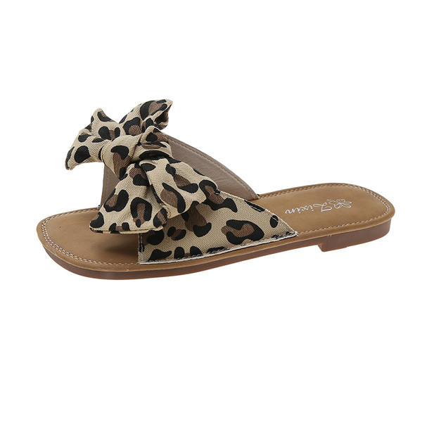 Moteriškos žemos šlepetės su tekstiliniu kaspinu