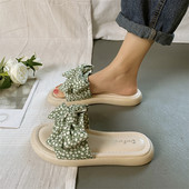 Ženske papuče na točkice sa trakom