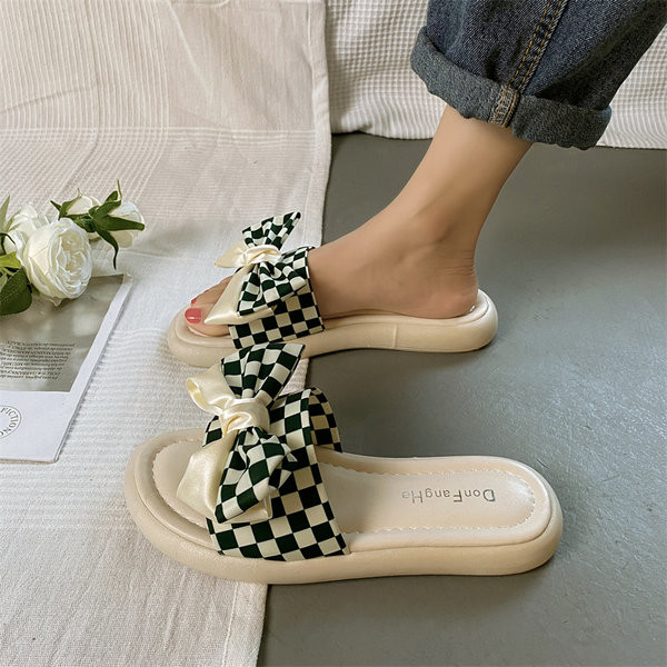 Ženske papuče s ravnim potplatom i satenskom trakom