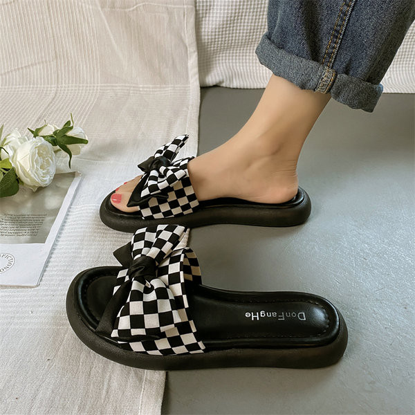 Ženske papuče s ravnim potplatom i satenskom trakom