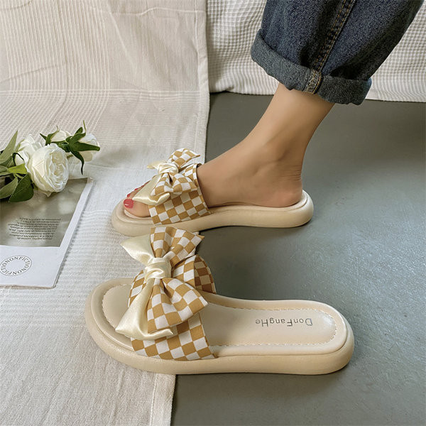 Ženske papuče s ravnim potplatom i satenskom trakom