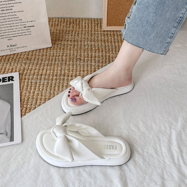 Γυναικείες παντόφλες ανάμεσα στα δάχτυλα από οικολογικό δέρμα με κορδέλα