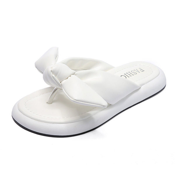 Γυναικείες παντόφλες ανάμεσα στα δάχτυλα από οικολογικό δέρμα με κορδέλα