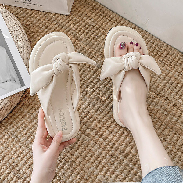 Γυναικείες παντόφλες ανάμεσα στα δάχτυλα από οικολογικό δέρμα με κορδέλα