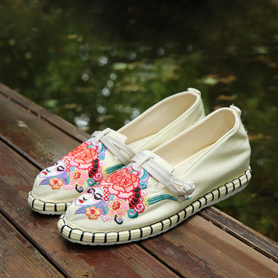 Ženske ležerne zatvorene papuče s ravnim potplatom i vezom