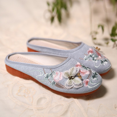 Zaobljene tekstilne papuče s vezom u boji