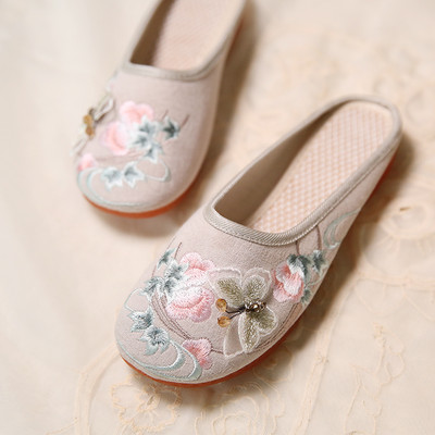 Zaobljene tekstilne papuče s vezom u boji