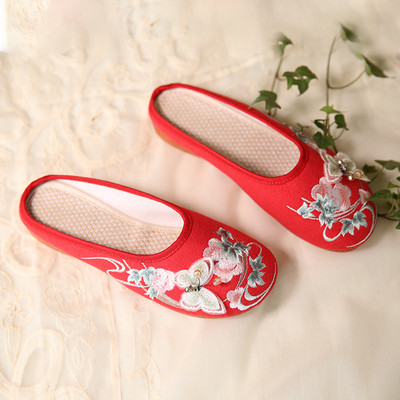 Zaobljene tekstilne papuče s vezom u boji