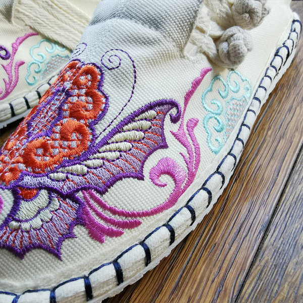 Ženske tekstilne papuče s vezom u boji