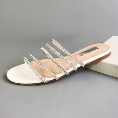 Ženske papuče s ravnim potplatom s ukrasnim kamenčićima