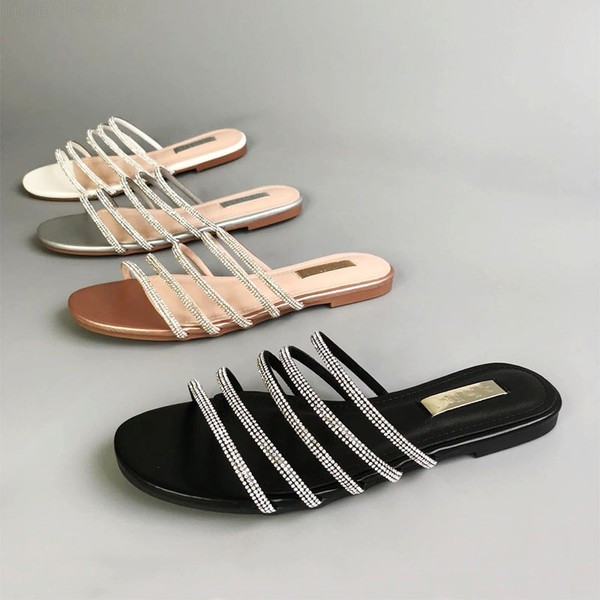 Ženske papuče s ravnim potplatom s ukrasnim kamenčićima