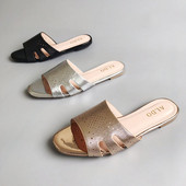 Ženske papuče od umjetne kože s ravnim potplatom