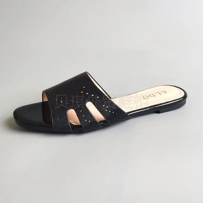 Ženske papuče od umjetne kože s ravnim potplatom